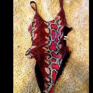 High cut side cutout leopard one piece FashionNova